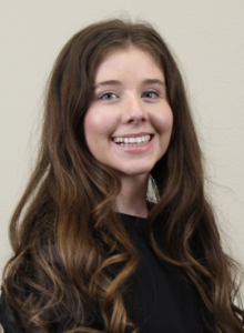 A woman smiling. 